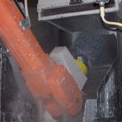 Robots also sand trees after each slurry layer.