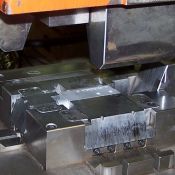 We design and build our coin dies to press and straighten parts that have precise size and flatness 
