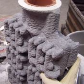 Handles are removed from completed trees as they are prepared for wax removal.